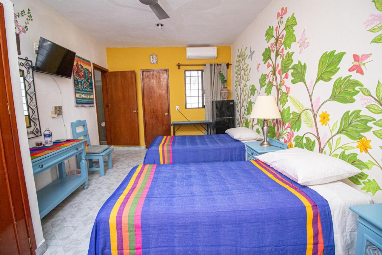 La Casa Del Almendro Hotel Playa del Carmen Bagian luar foto
