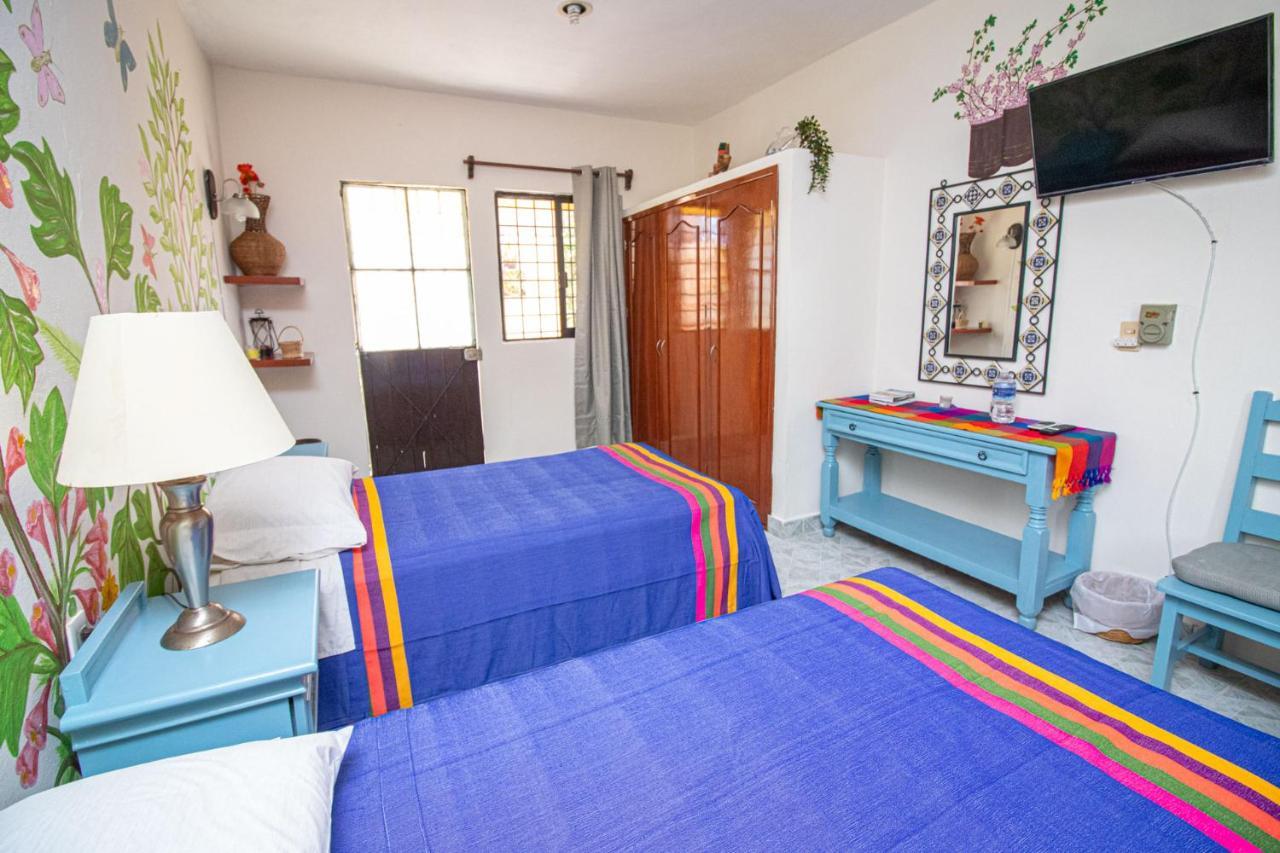 La Casa Del Almendro Hotel Playa del Carmen Bagian luar foto